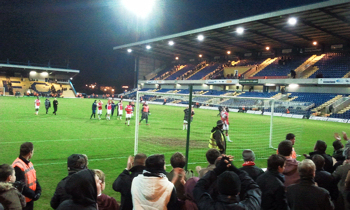 Harriers fans celebrate after the 2-0 win at Mansfield